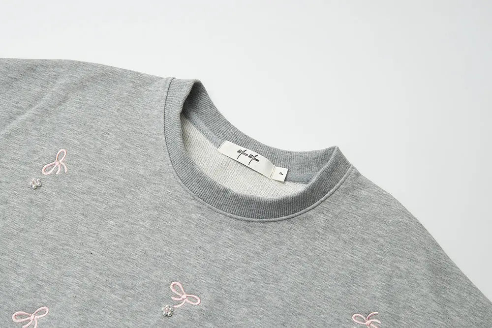 An image of a   31729 Bow Embroidered Crewneck Sweatshirt by  Mirra Masa