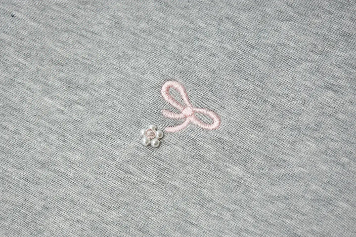An image of a   31729 Bow Embroidered Crewneck Sweatshirt by  Mirra Masa