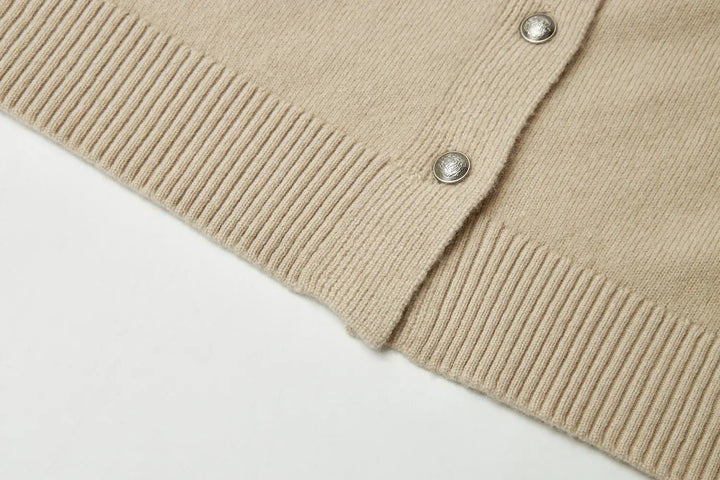 An image of a   31748 Tilted Neckline Button Cardigan by  Mirra Masa