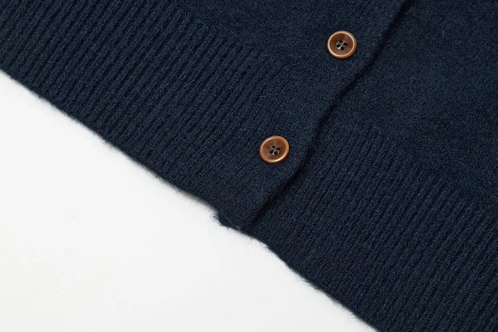 An image of a   31787 Roundneck Button Down Cardigan by  Mirra Masa