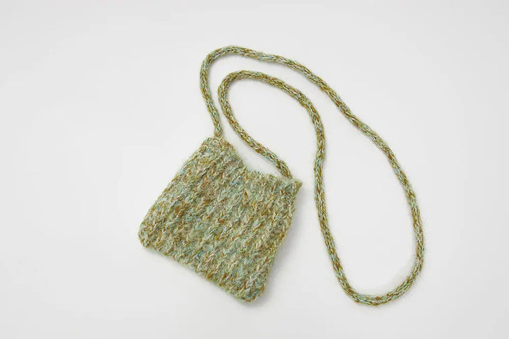 An image of a   31809 Pullover Sweater with Pouch by  Mirra Masa