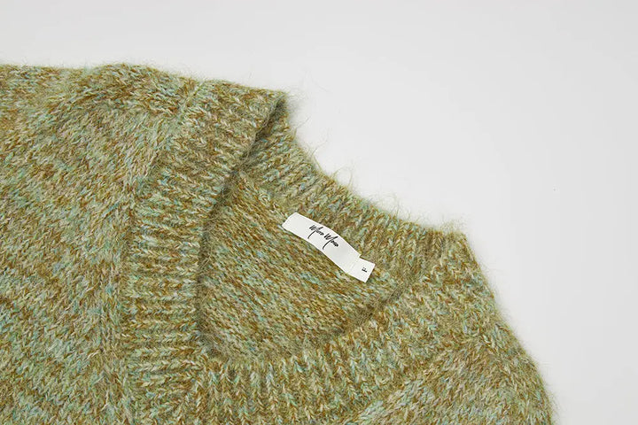 An image of a   31809 Pullover Sweater with Pouch by  Mirra Masa