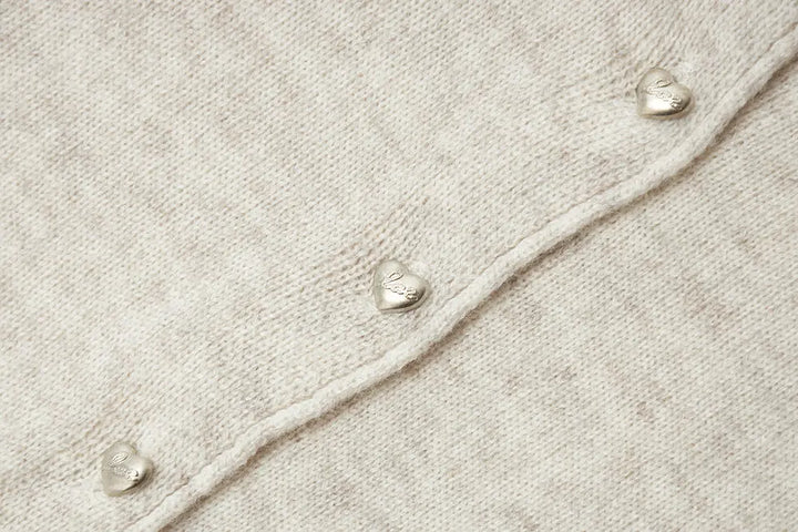 An image of a   31896 Wool Blend Heart Cardigan by  Mirra Masa
