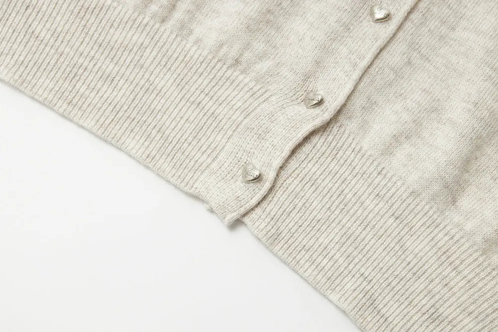 An image of a   31896 Wool Blend Heart Cardigan by  Mirra Masa