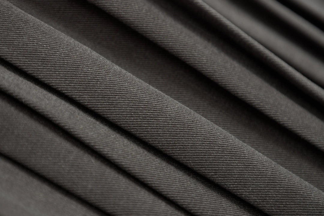 An image of a   32032 Pleated Mini Skirt with String Belts by  Mirra Masa