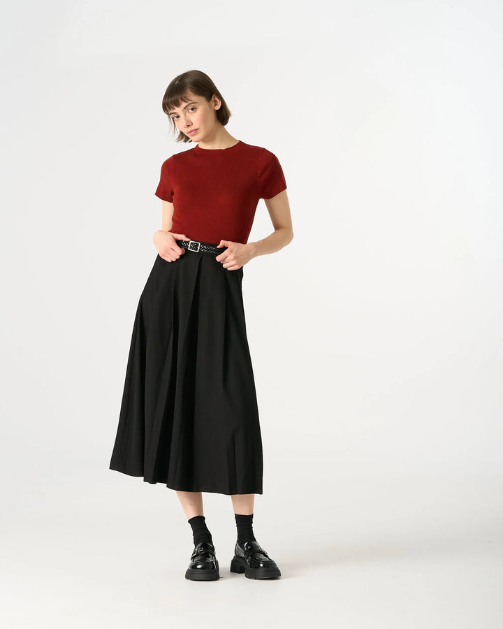 An image of a   32307 Pleated Midi Skirt by  Mirra Masa