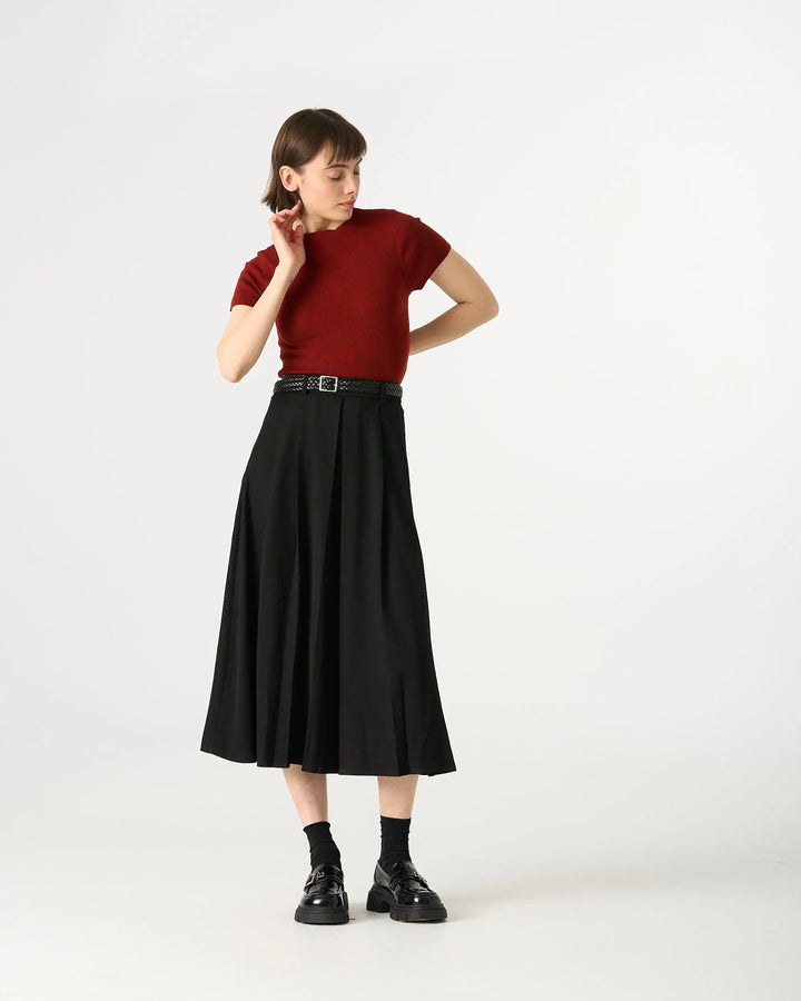 An image of a   32307 Pleated Midi Skirt by  Mirra Masa