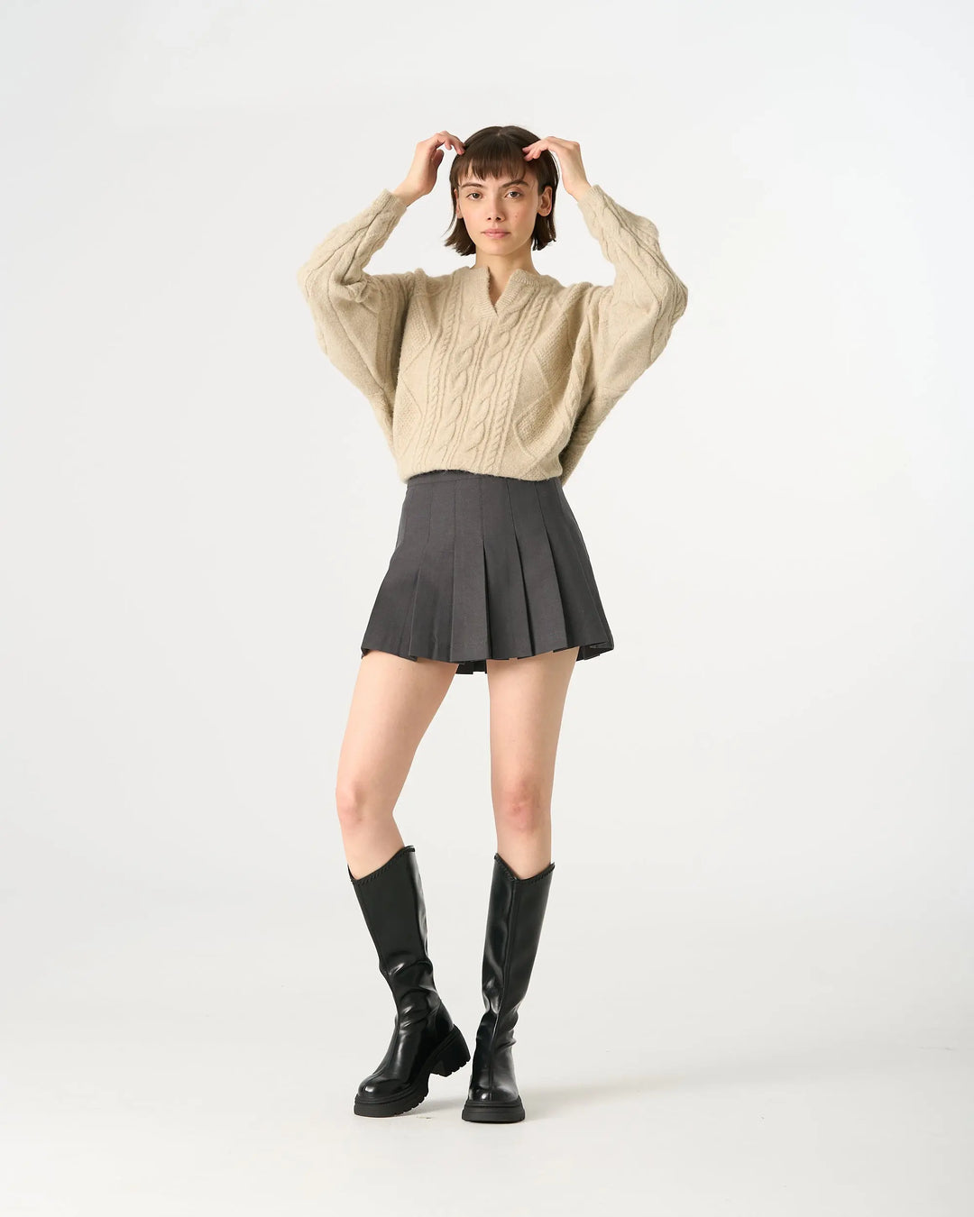 An image of a   32840 Pleated Mini Skirt by  Mirra Masa