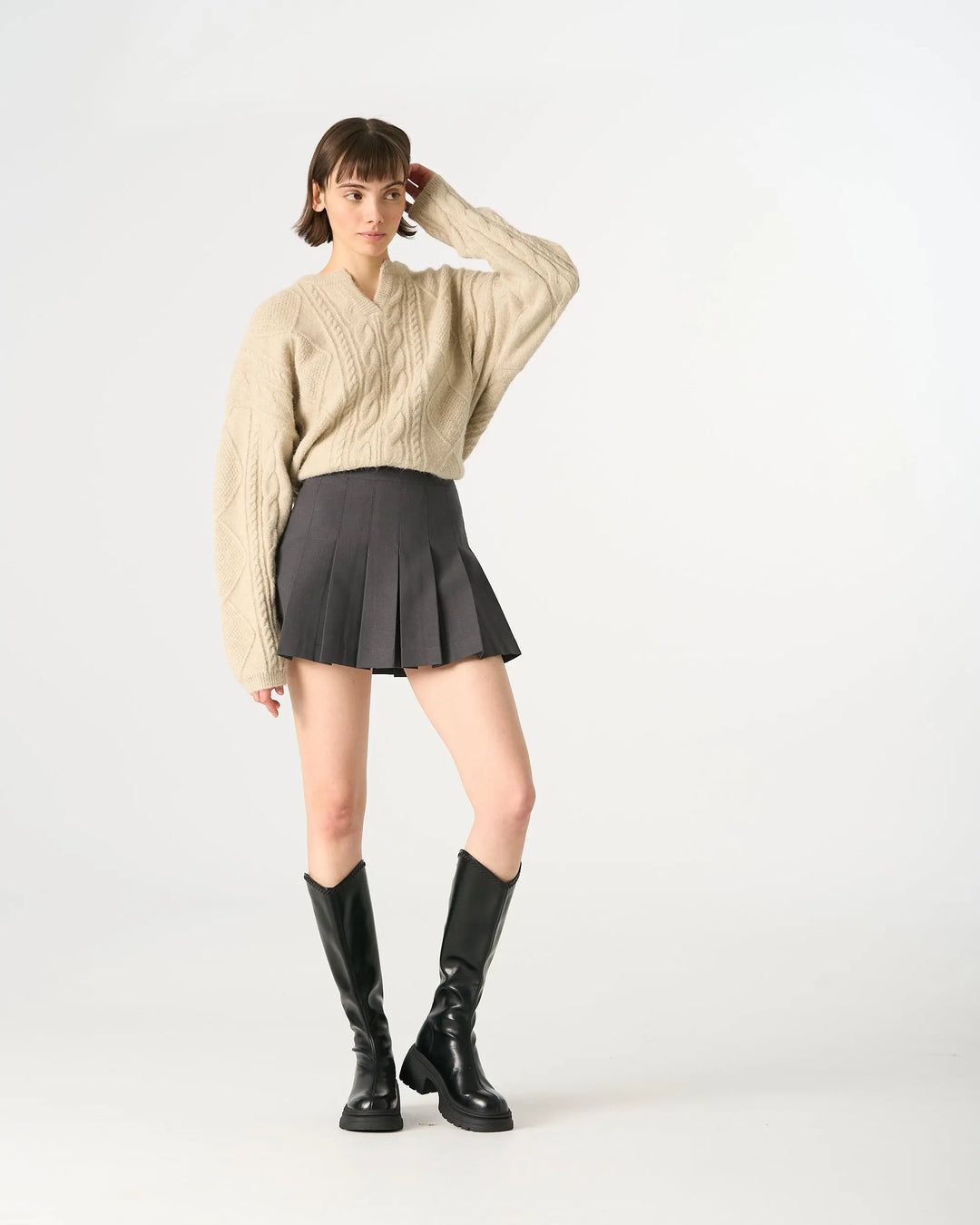 An image of a   32840 Pleated Mini Skirt by  Mirra Masa
