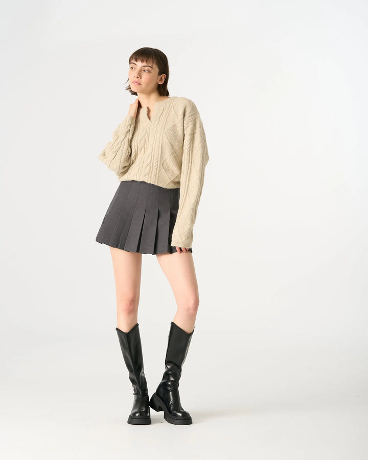 An image of a  Grey / Large 32840 Pleated Mini Skirt by  Mirra Masa