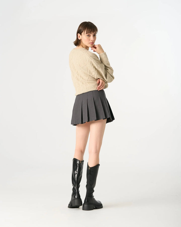An image of a   32840 Pleated Mini Skirt by  Mirra Masa