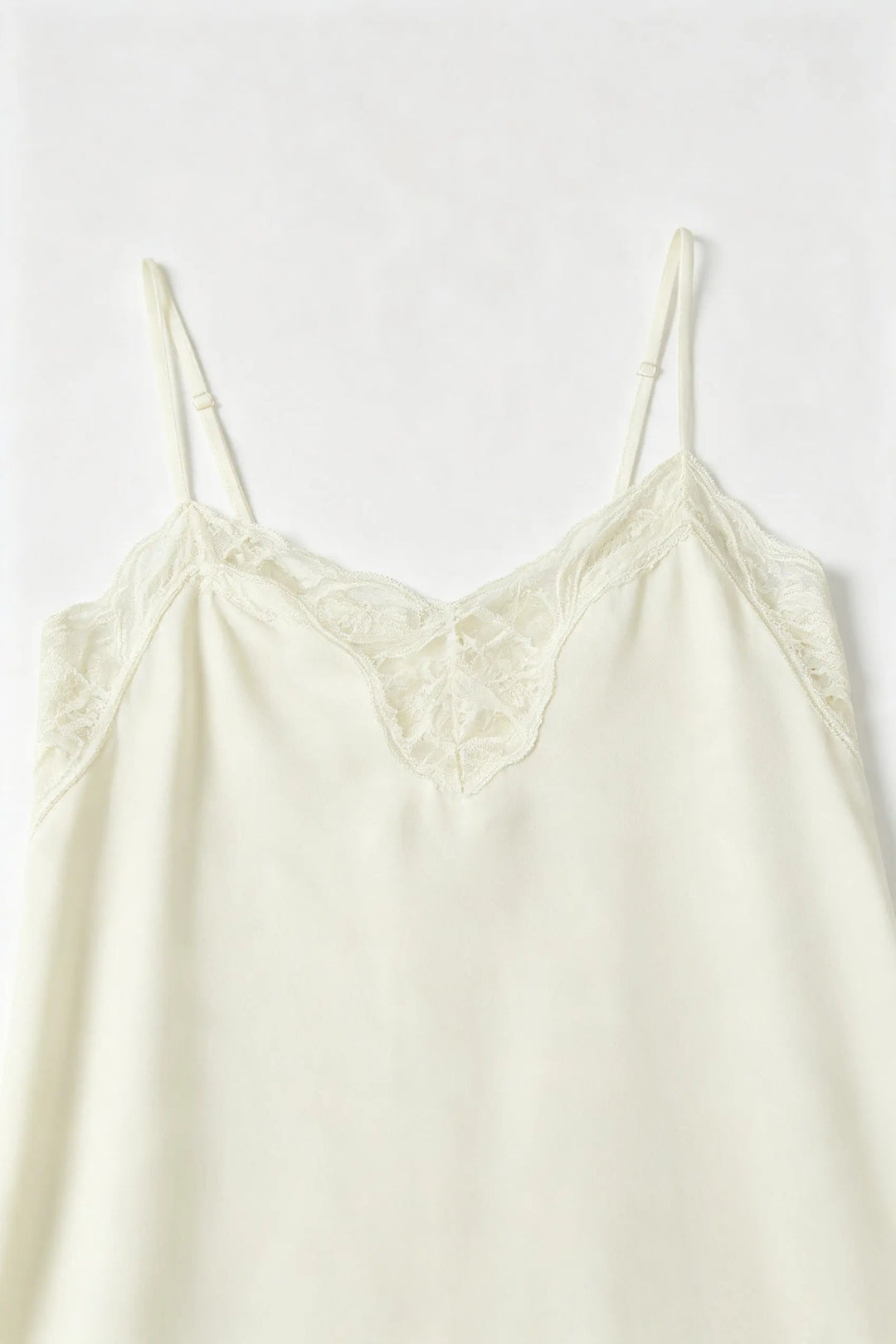 An image of a   33112 Lace Trim Slip Dress by  Mirra Masa