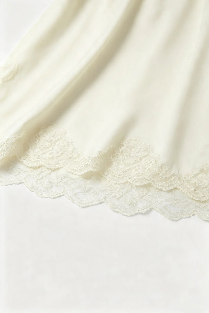 An image of a   33112 Lace Trim Slip Dress by  Mirra Masa