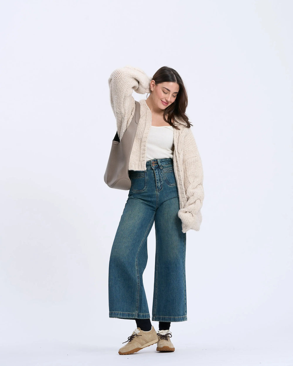 An image of a  Beige / onesize 3374Q Cable Knit Cardigan by  Mirra Masa