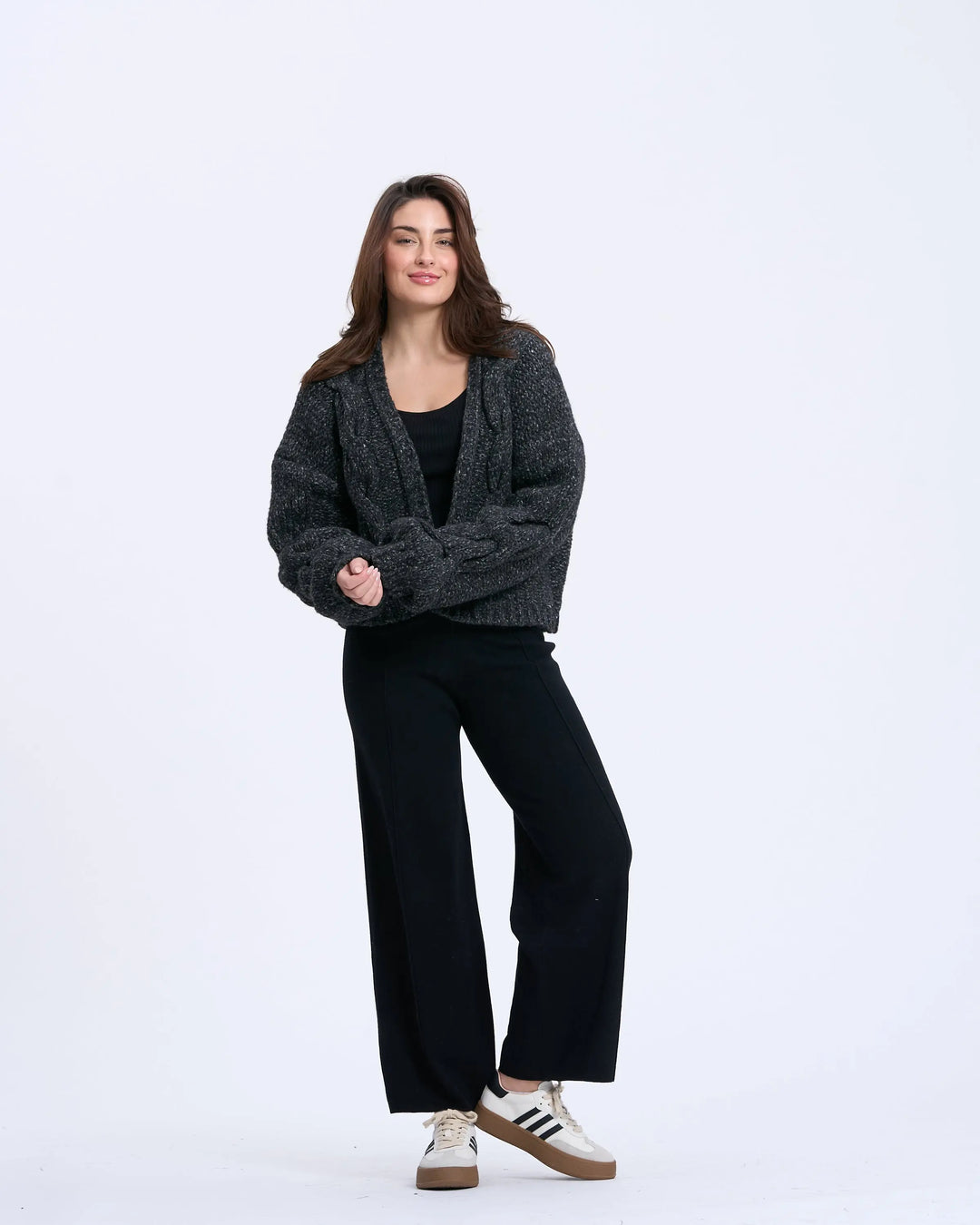 An image of a  Black / onesize 3374Q Cable Knit Cardigan by  Mirra Masa
