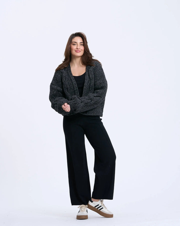 An image of a  Black / onesize 3374Q Cable Knit Cardigan by  Mirra Masa