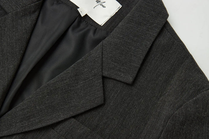 An image of a   34035 Minimalist Back-Slit Blazer by  Mirra Masa