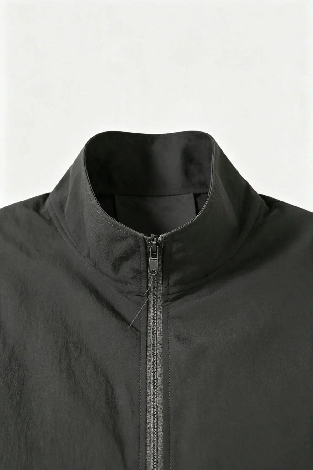 An image of a   34136 Essential Zip-Up Jacket by  Mirra Masa