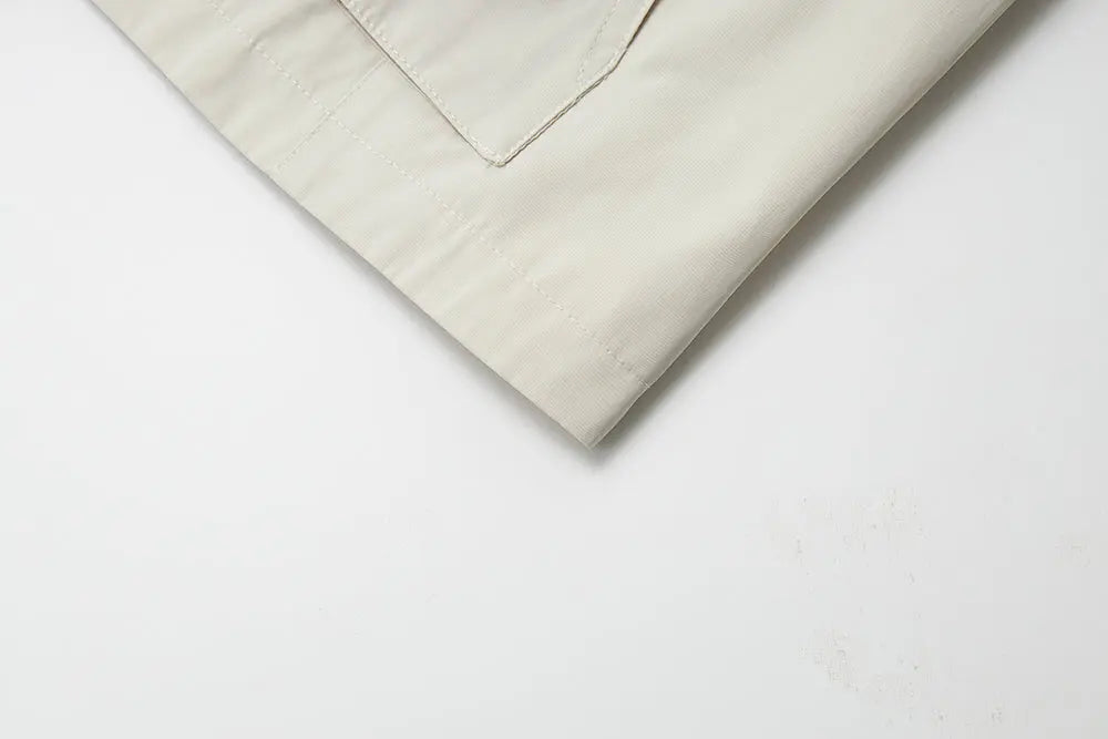 An image of a   34525 Cropped Two Tone Jacket by  Mirra Masa