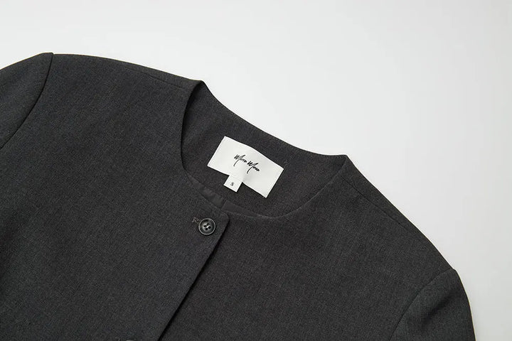 An image of a   34549 Minimalist Two-Button Cropped Blazer by  Mirra Masa