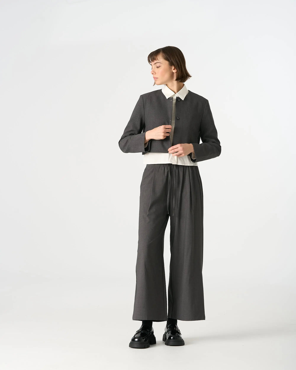 An image of a   34549 Minimalist Two-Button Cropped Blazer by  Mirra Masa