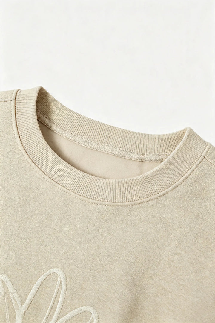 An image of a   34684 Embroidered Sweatshirt by  Mirra Masa