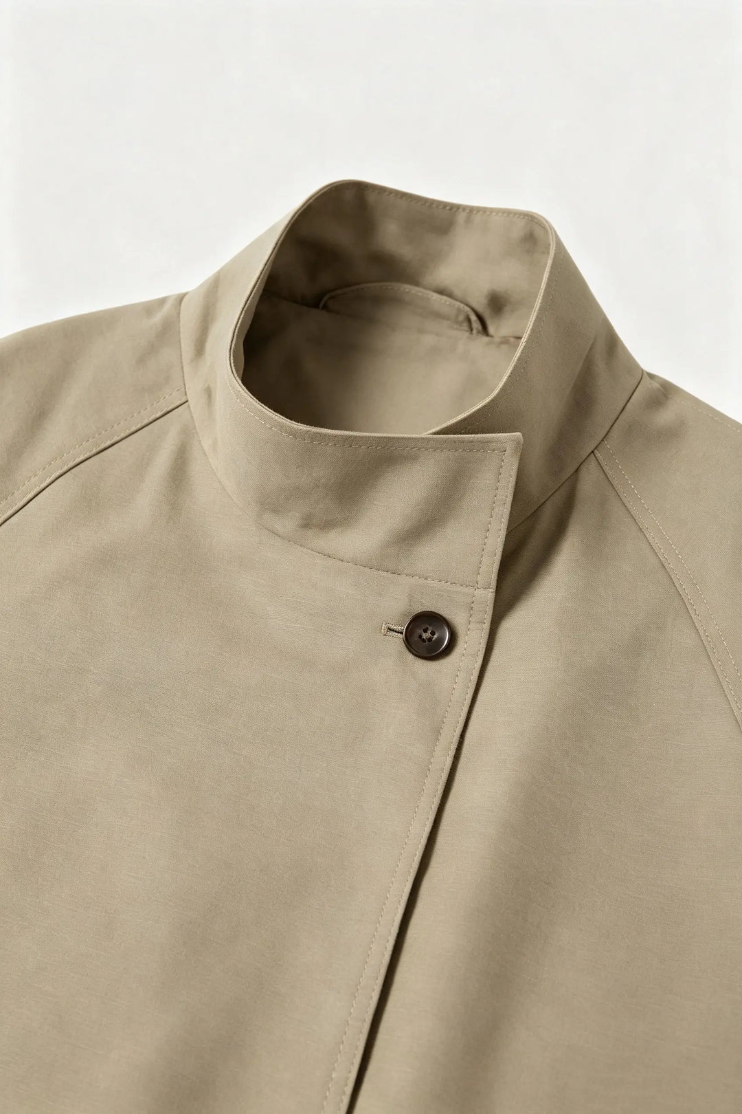 An image of a   34758 Sculpted trench coat by  Mirra Masa