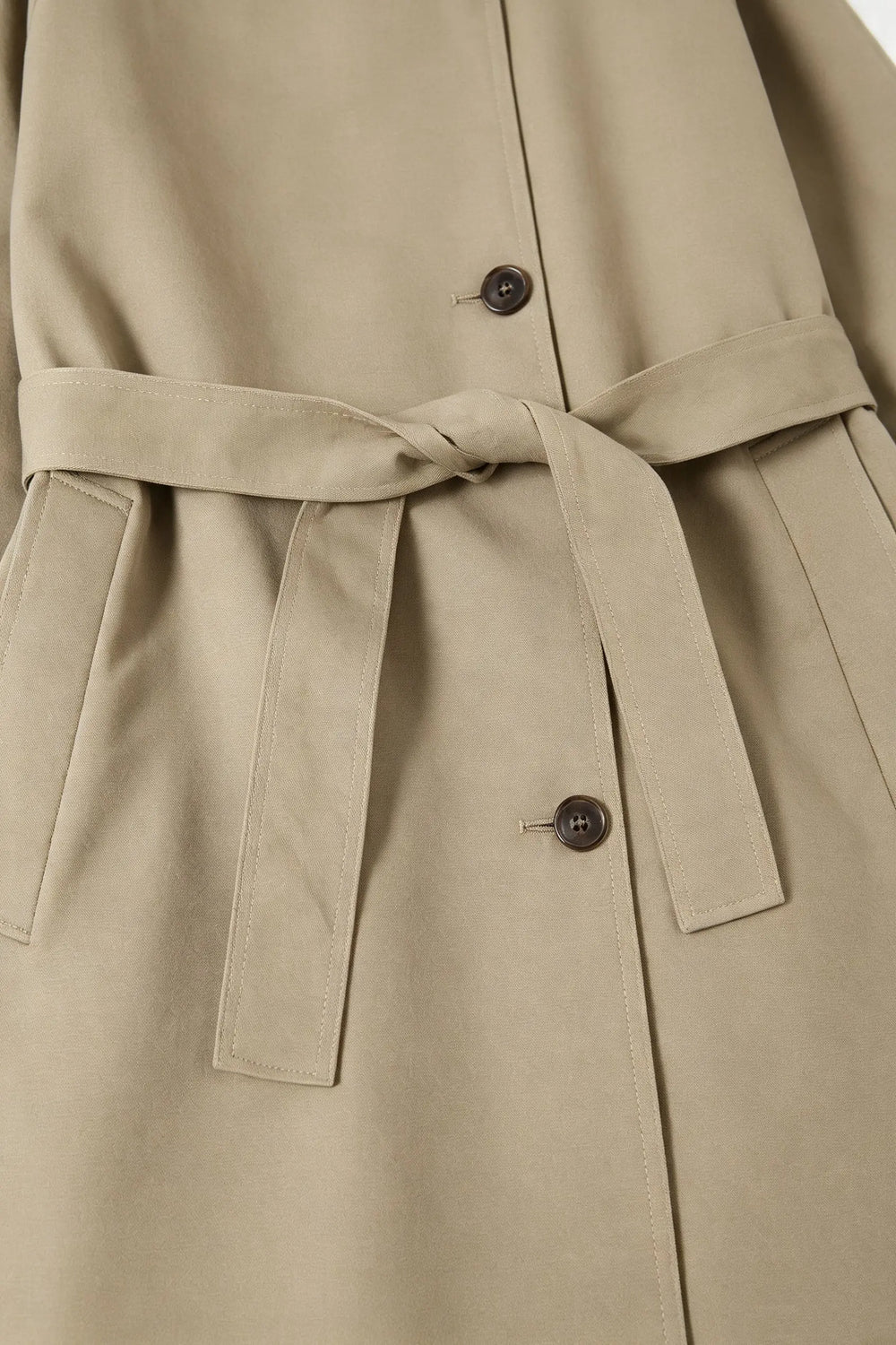 An image of a   34758 Sculpted trench coat by  Mirra Masa