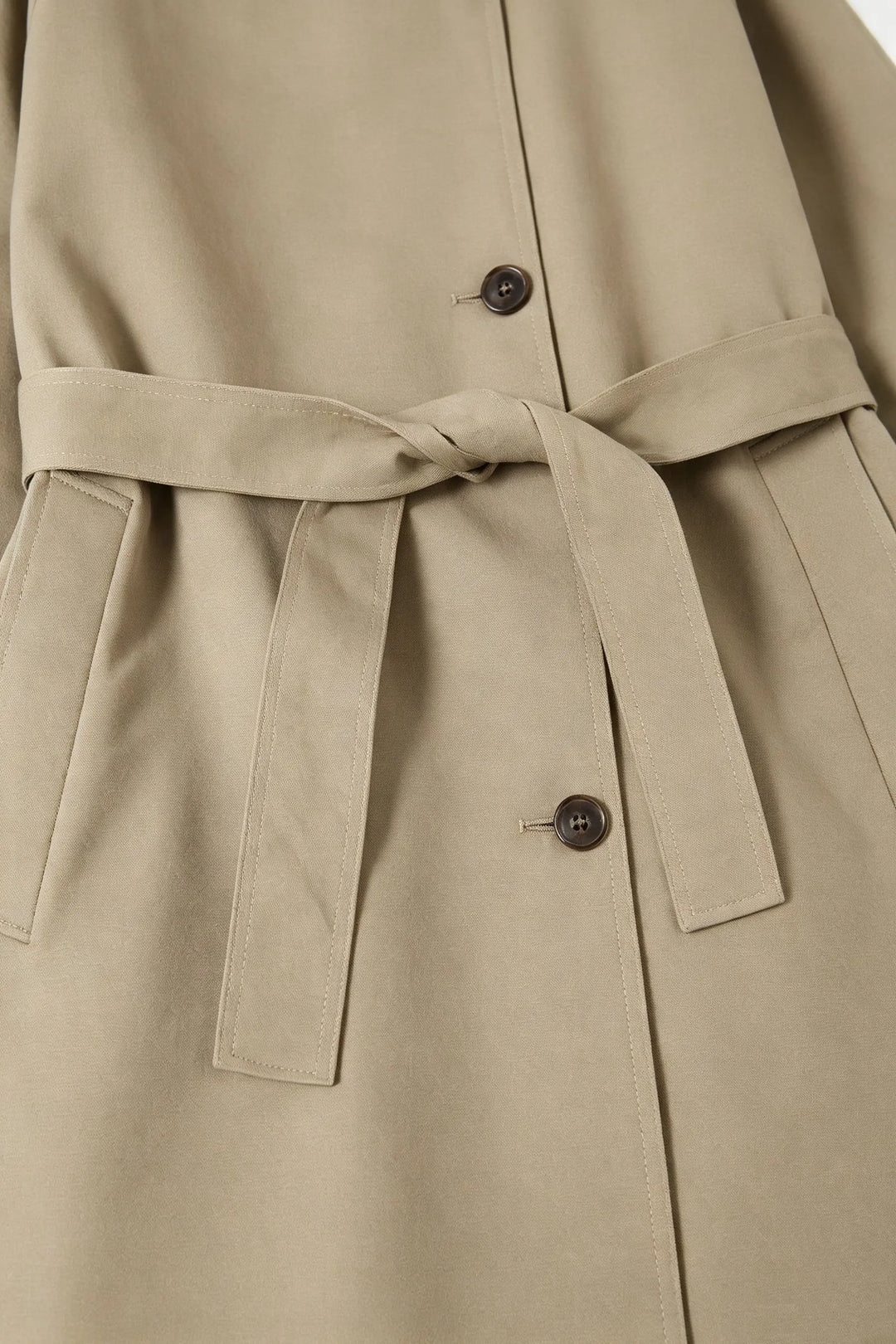 An image of a   34758 Sculpted trench coat by  Mirra Masa
