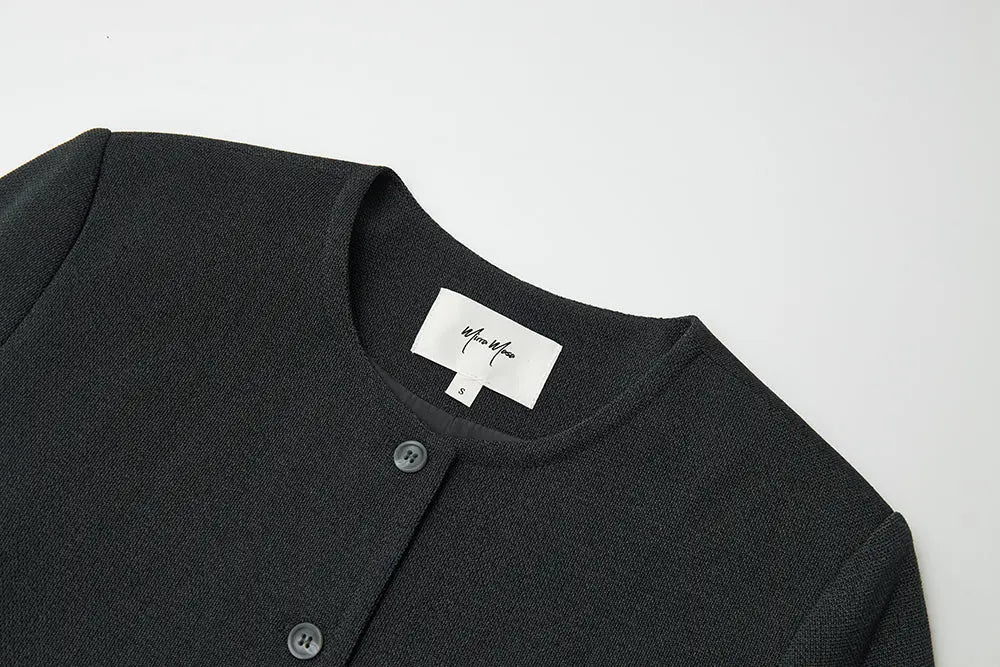 An image of a   34951 Minimalist Cropped Knit Blazer by  Mirra Masa