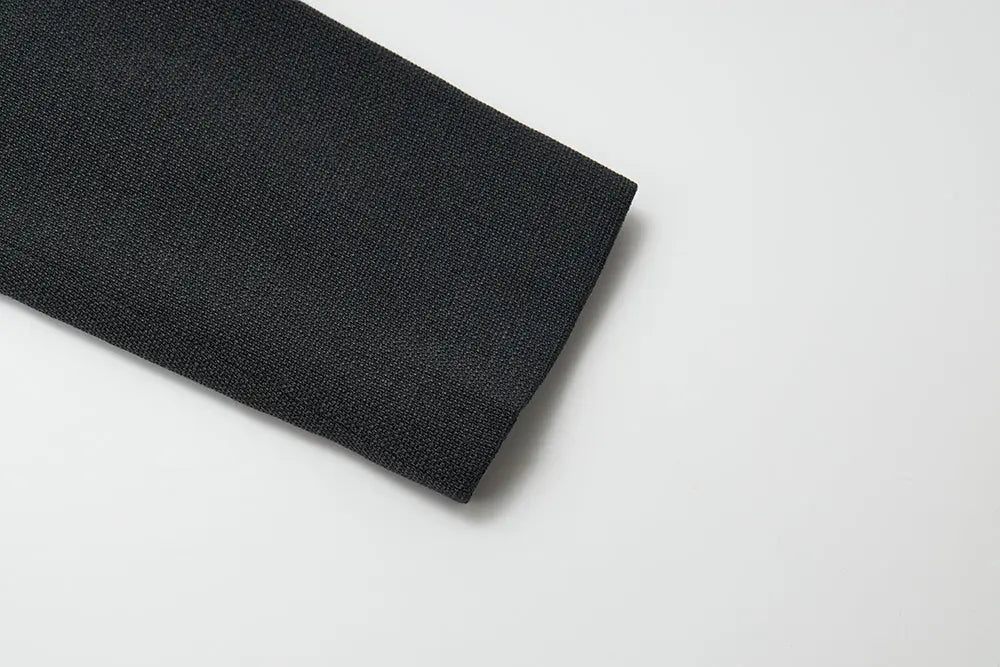 An image of a   34951 Minimalist Cropped Knit Blazer by  Mirra Masa