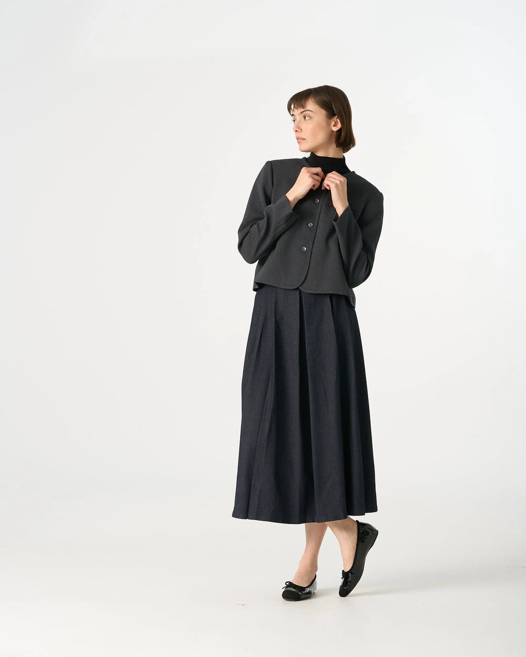 An image of a   34951 Minimalist Cropped Knit Blazer by  Mirra Masa