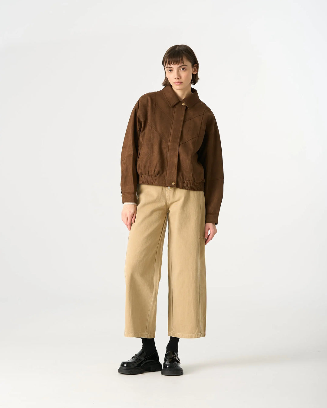 An image of a   34958 Suede Form Stretch Zip Jacket by  Mirra Masa