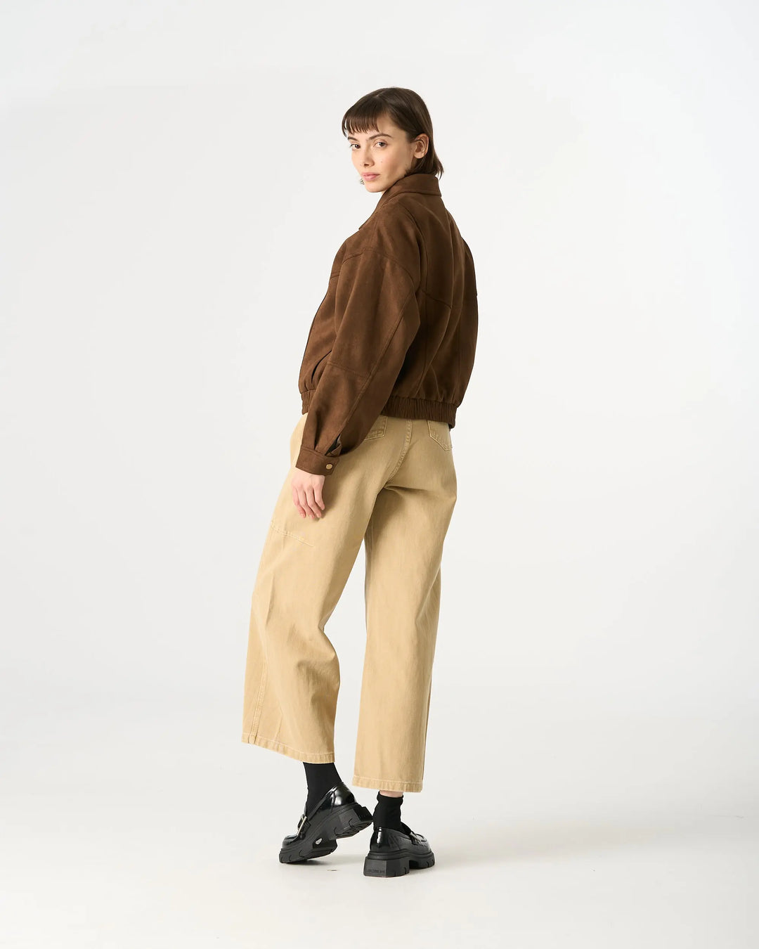 An image of a   34958 Suede Form Stretch Zip Jacket by  Mirra Masa