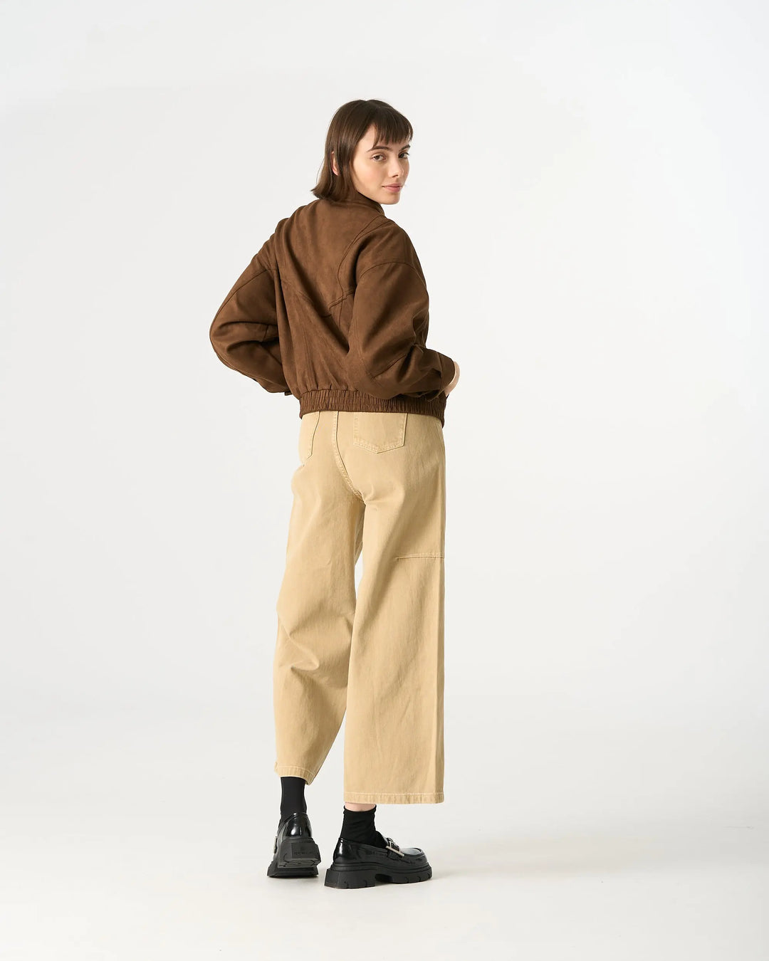 An image of a   34958 Suede Form Stretch Zip Jacket by  Mirra Masa