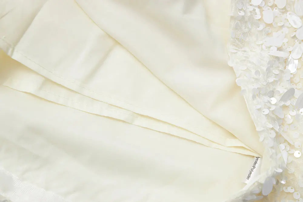 An image of a   40763 Sequin Mini Skirt by  Mirra Masa