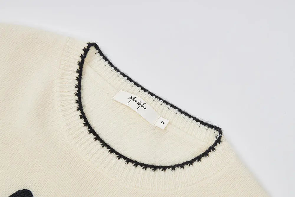 An image of a   41093 Kitten Crewneck Wool Sweater by  Mirra Masa