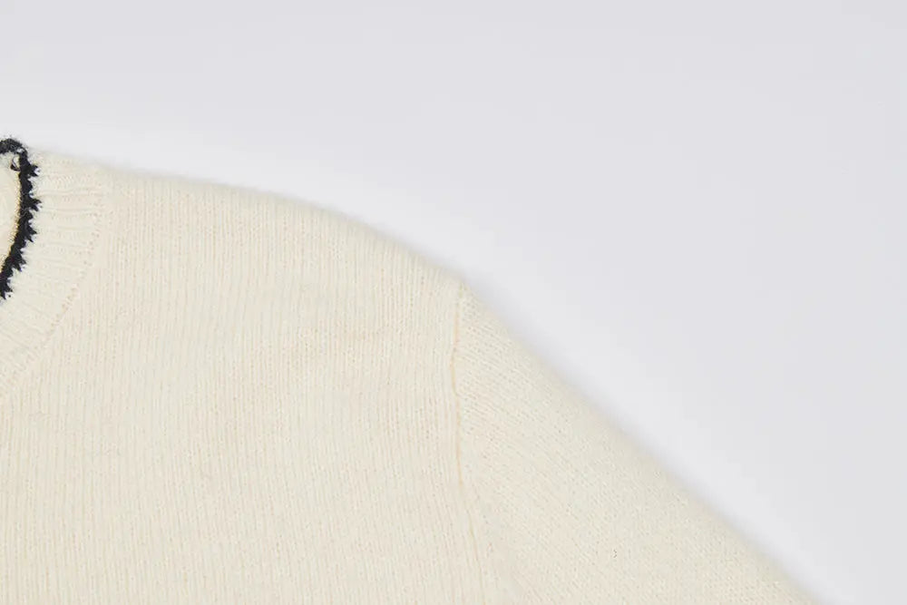 An image of a   41093 Kitten Crewneck Wool Sweater by  Mirra Masa