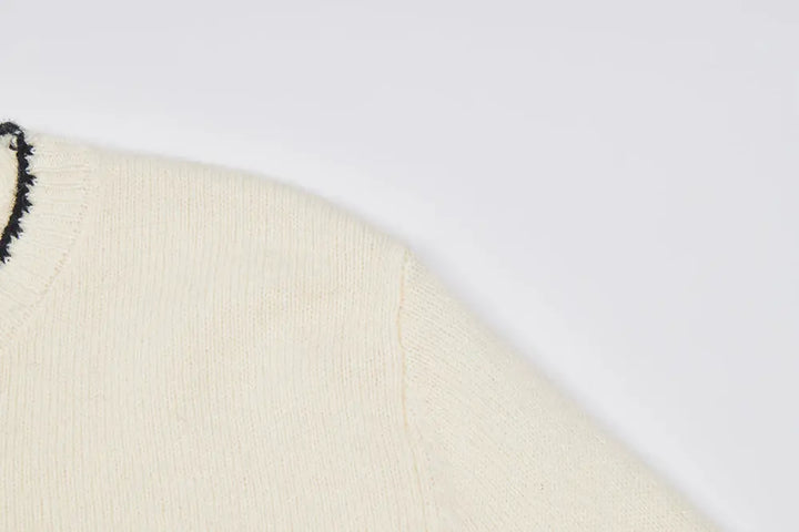 An image of a   41093 Kitten Crewneck Wool Sweater by  Mirra Masa