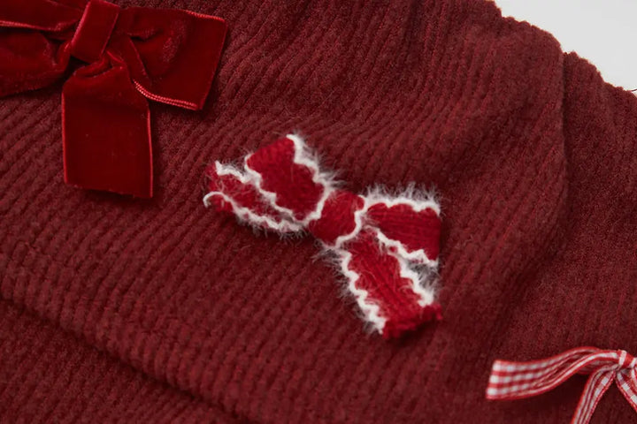 An image of a   41103 Holiday Bow Off Shoulder Top by  Mirra Masa