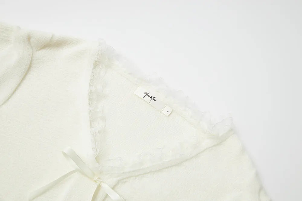 An image of a   41117 Lace Trim V-Neck Cable Sweater by  Mirra Masa