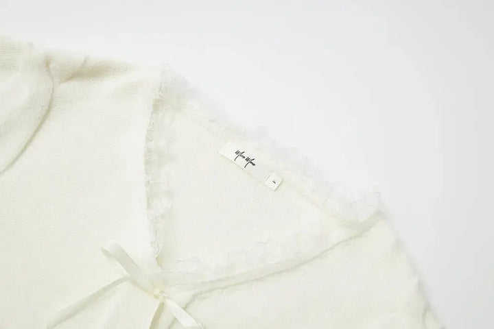 An image of a   41117 Lace Trim V-Neck Cable Sweater by  Mirra Masa