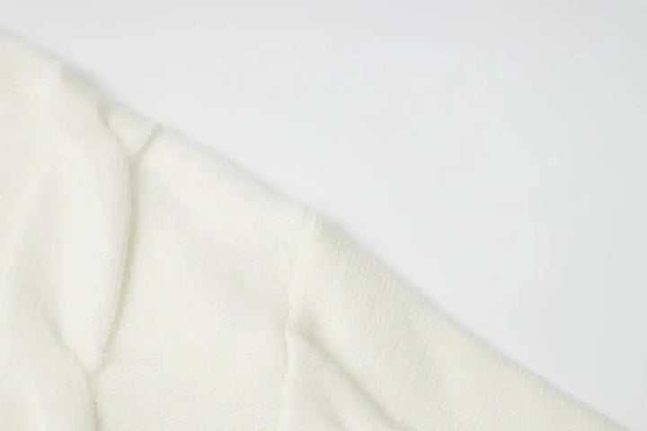 An image of a   41117 Lace Trim V-Neck Cable Sweater by  Mirra Masa