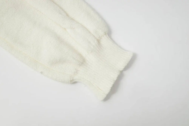 An image of a   41117 Lace Trim V-Neck Cable Sweater by  Mirra Masa