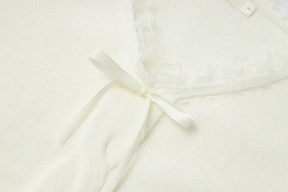 An image of a   41117 Lace Trim V-Neck Cable Sweater by  Mirra Masa