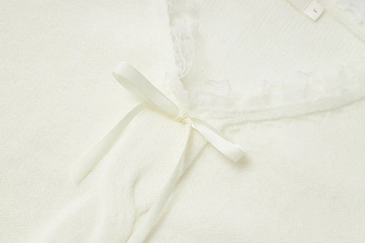 An image of a   41117 Lace Trim V-Neck Cable Sweater by  Mirra Masa