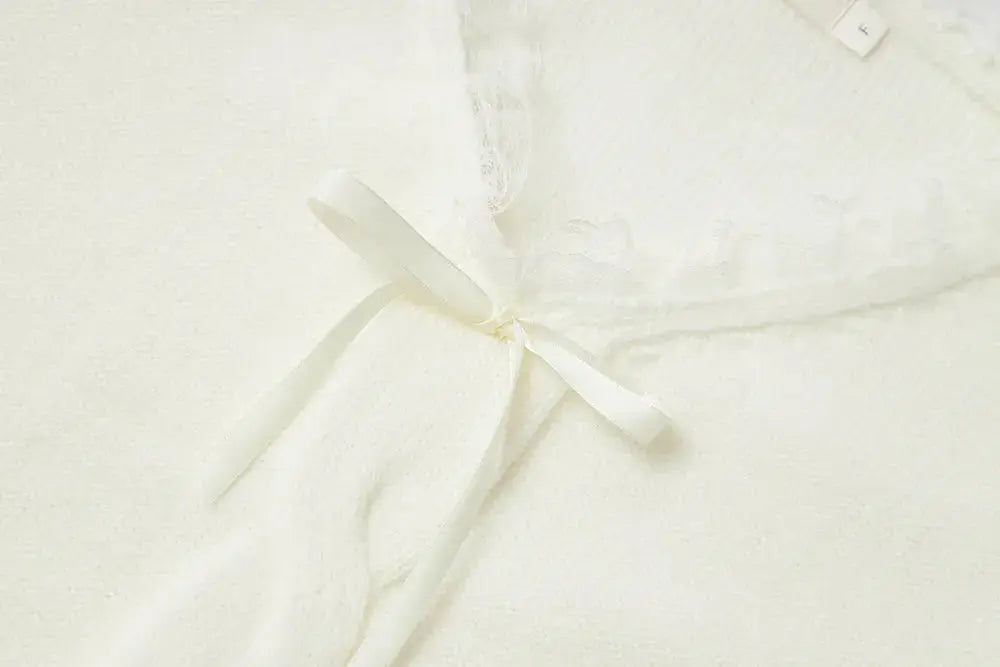 An image of a   41117 Lace Trim V-Neck Cable Sweater by  Mirra Masa