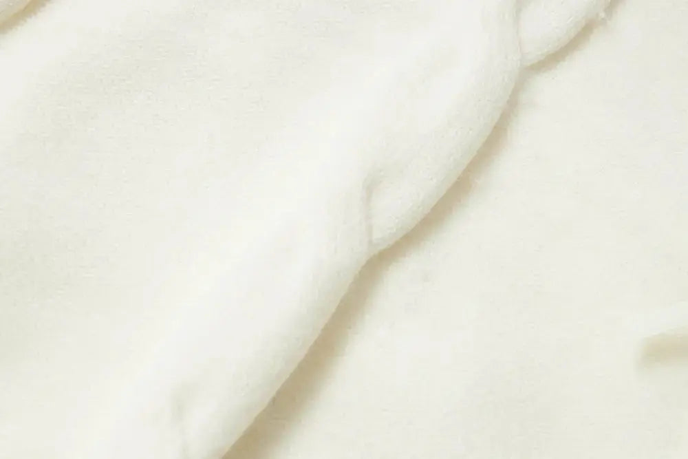 An image of a   41117 Lace Trim V-Neck Cable Sweater by  Mirra Masa