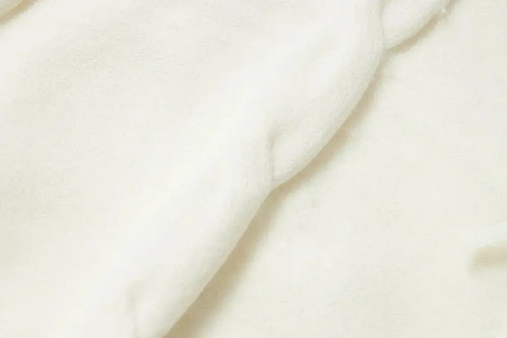 An image of a   41117 Lace Trim V-Neck Cable Sweater by  Mirra Masa