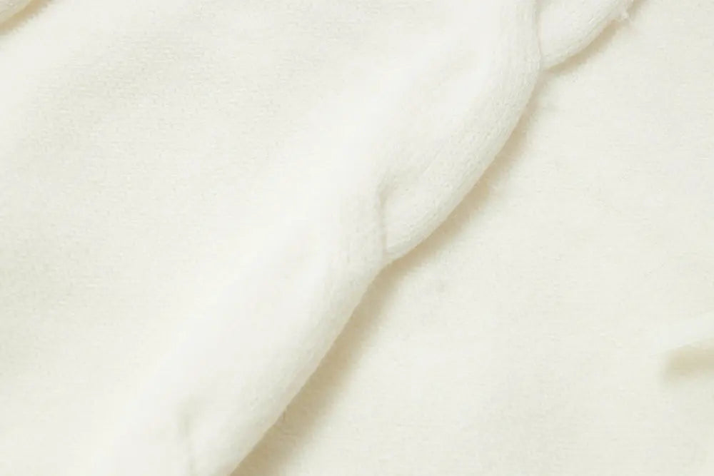 An image of a   41117 Lace Trim V-Neck Cable Sweater by  Mirra Masa